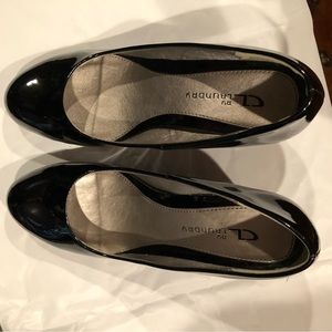 Black patent leather wedge pumps